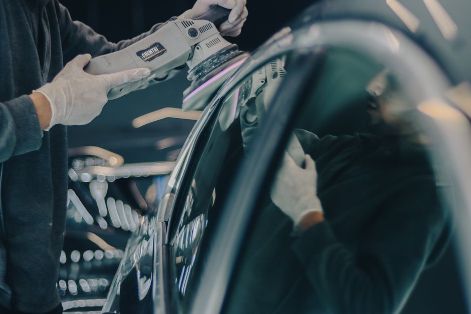 Auto detailing professional at work